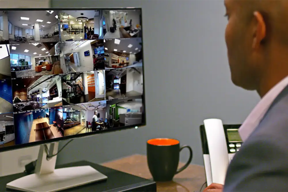 Commercial and residential security monitoring with multi-camera surveillance system